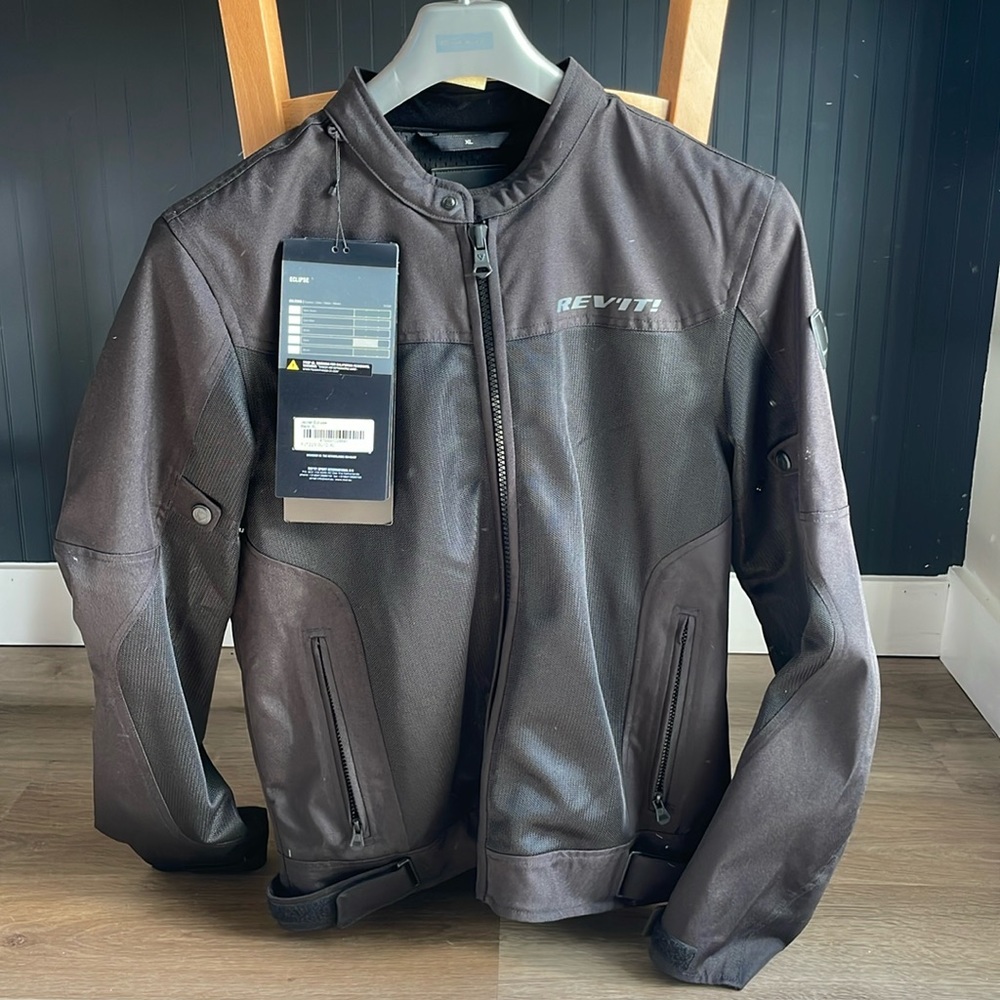 Black mens XL motorcycle jacket with tags